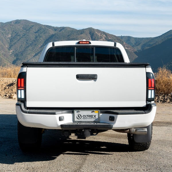 AlphaRex (NOVA-Series) 2005-2015 Toyota Tacoma Prismatic LED Tail Lights - Black