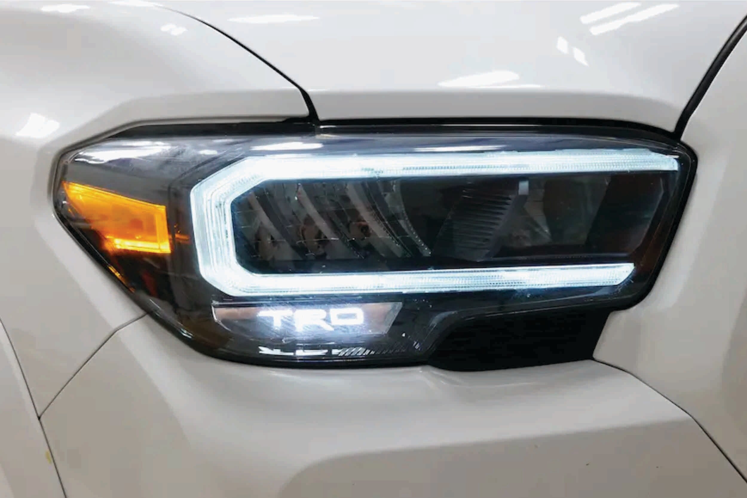 OEM LED Headlight: Toyota Tacoma (16-23 / TRD Pro / Left)
