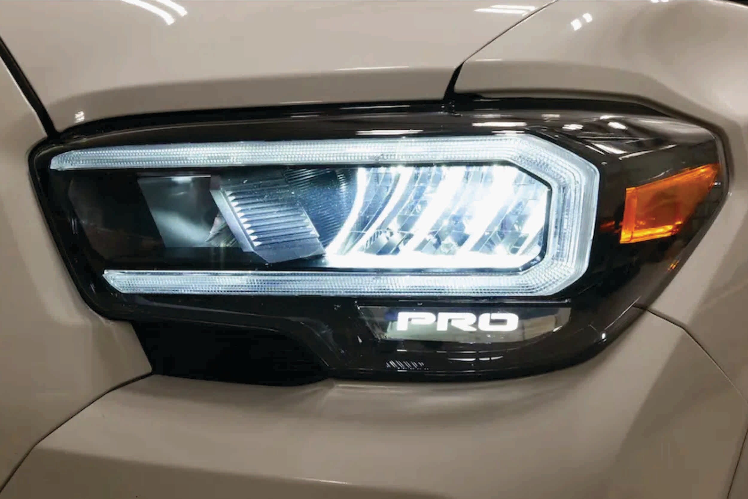 OEM LED Headlight: Toyota Tacoma (16-23 / TRD Pro / Left)