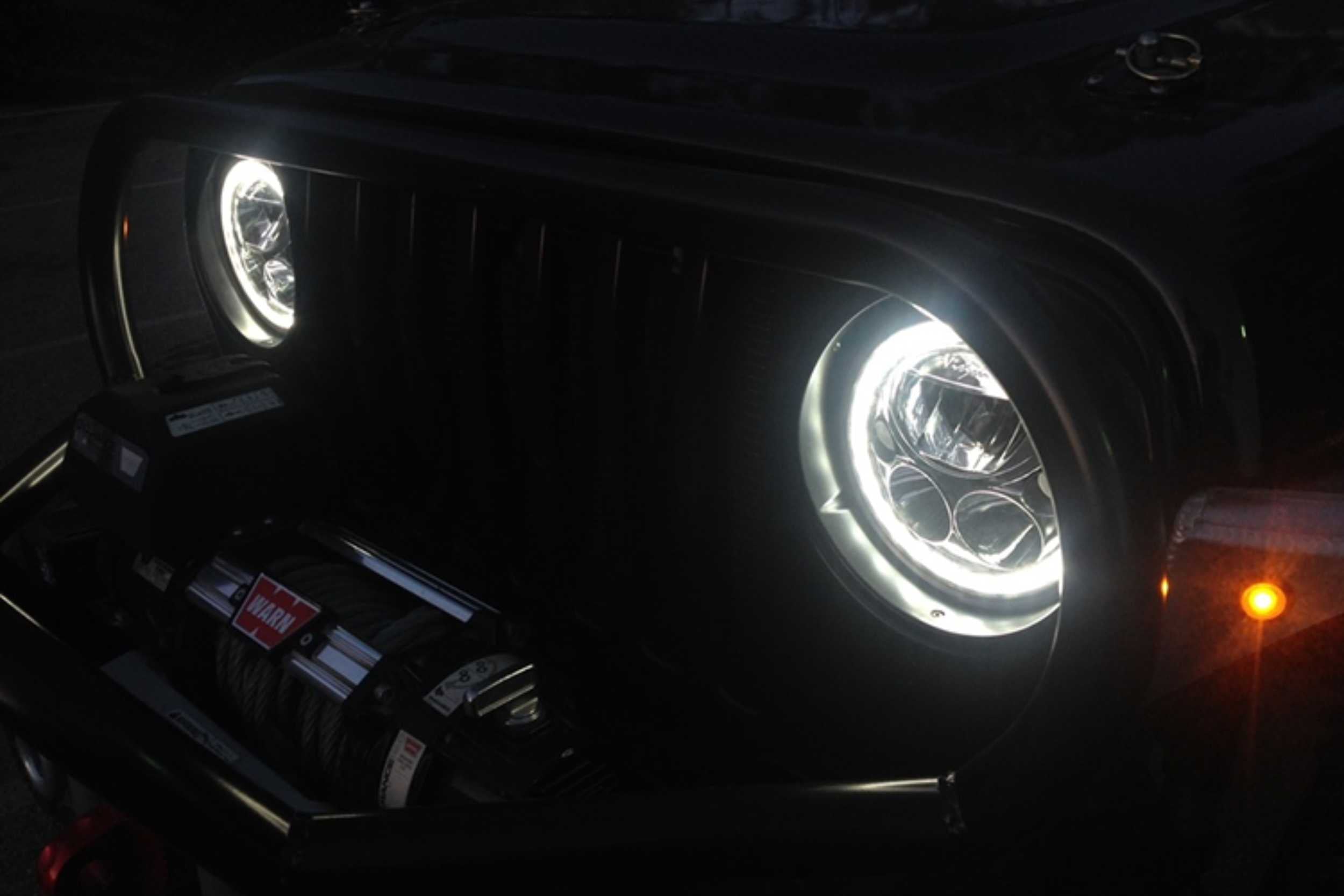 Vision X LED Headlights: (Each / 7in Round / Black / White Halo) (Motorcycle Spec)